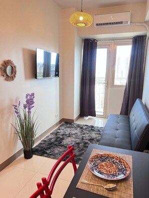 Living area - Unistay Coast Res R31 with Bal-Sunset Vw (Pasay)