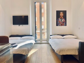 1 غرفة نوم ومكواة/لوح كي وواي فاي وملاءات أسرّة