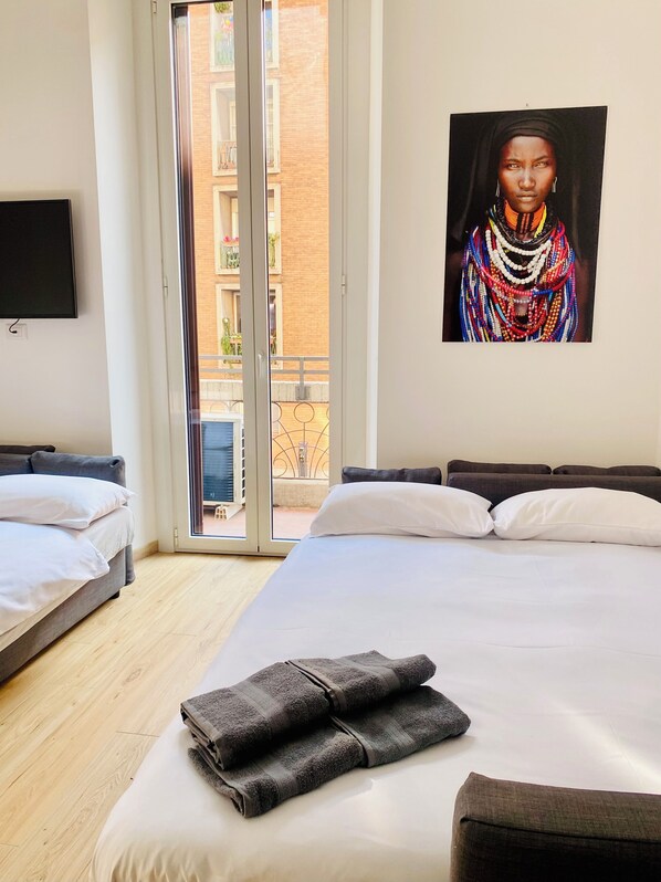 1 غرفة نوم ومكواة/لوح كي وواي فاي وملاءات أسرّة