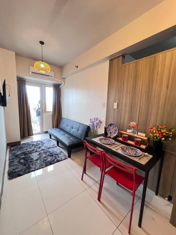 Living area - Unistay Coast Res R19 with Bal-Sunset Vw (Pasay)