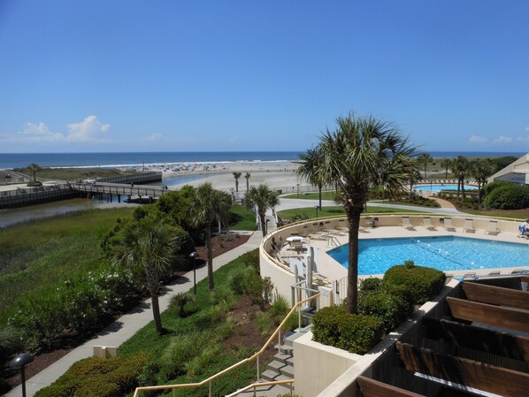 A resort with a pool, beach, and ocean view. - Oceanfront Oasis-New! Luxury 2BD/2BA, Two Balconies, Best Beach on Grand Strand! (Myrtle Beach)