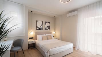 Deluxe-huoneisto, 4 makuuhuonetta, kaupunkinäköala | 4 makuuhuonetta, tallelokero huoneessa, yksilöllisesti sisustettu