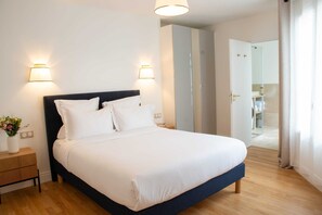 1 bedroom, desk, iron/ironing board, travel cot