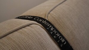 A close-up of a fabric with a black label that reads 'Contemporary.'