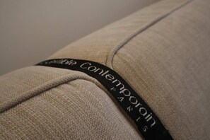A close-up of a fabric with a black label that reads 'Contemporary.'