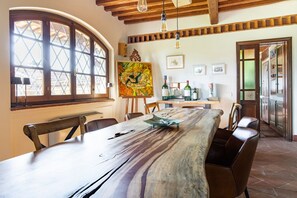 Dining - Podere La Troscia is an enchanting Rustic Villa in the Versilia countryside on the Tuscan coast with Garden and Private Pool; the owners love to share this wonderful place with guests from all over the world who intend to visit the North of Tuscany, the  (Piano di Mommio)
