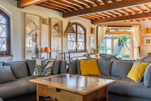 TV, books - Podere La Troscia is an enchanting Rustic Villa in the Versilia countryside on the Tuscan coast with Garden and Private Pool; the owners love to share this wonderful place with guests from all over the world who intend to visit the North of Tuscany, the  (Piano di Mommio)