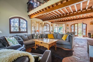 TV, books - Podere La Troscia is an enchanting Rustic Villa in the Versilia countryside on the Tuscan coast with Garden and Private Pool; the owners love to share this wonderful place with guests from all over the world who intend to visit the North of Tuscany, the  (Piano di Mommio)
