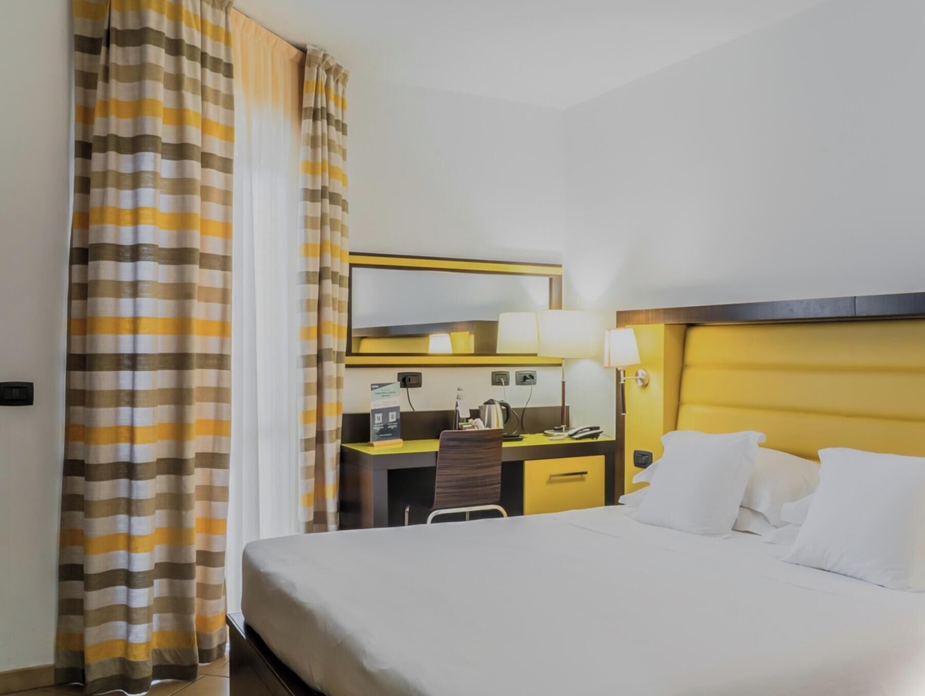 Minibar, WiFi (free), bed sheets