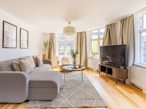 Apartamento, 1 quarto, vista para a cidade | Sala de estar