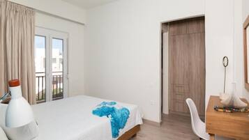 1 dormitorio, sistema de insonorización, tabla de planchar con plancha
