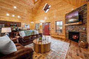 Téléviseur, foyer, table de baby-foot