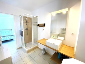 Shower, towels, toilet paper