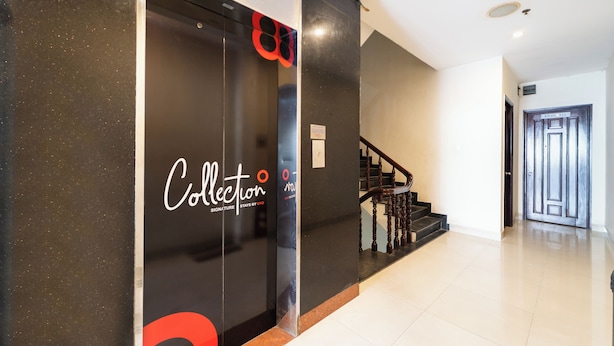 A modern elevator with a sign that reads "Collection" and "Stays by OYO." - Collection O District 10 Near Van Hanh Hospital Formerly Lan Rung Hotel (Ho Chi Minh City)