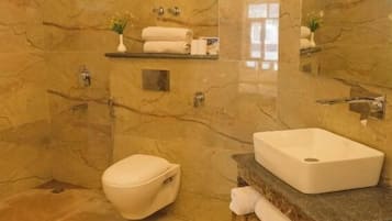 Shower, towels, soap, shampoo