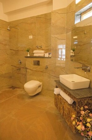 Shower, towels, soap, shampoo