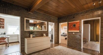 bonquartier | Moderne Wohnung mit Arbeitsplätzen, Terrasse & Parkplatz