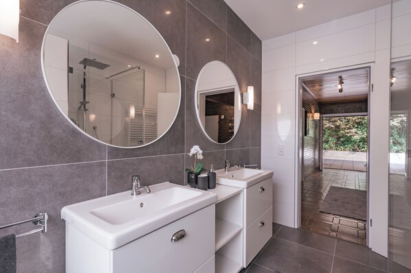 Shower, hair dryer, towels, soap