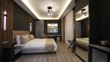 Studiosuite – elite | Sengetøy av topp kvalitet, minibar, safe på rommet og skrivebord