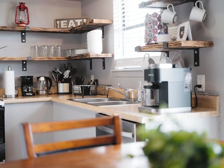 Private kitchen. Clean, Cozy 2BR, Patio, Near Razorback Stadium