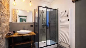 Departamento Deluxe | Baño | Batas