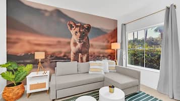 Jungle Safari 1 Bedroom Suite | Living area | 65-inch Smart TV with digital channels