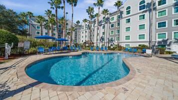 Outdoor pool, pool umbrellas, sun loungers