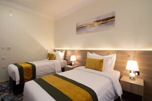 Desk, laptop workspace, blackout drapes, iron/ironing board - New Level Hotel – فندق نيوليفيل (Makkah)