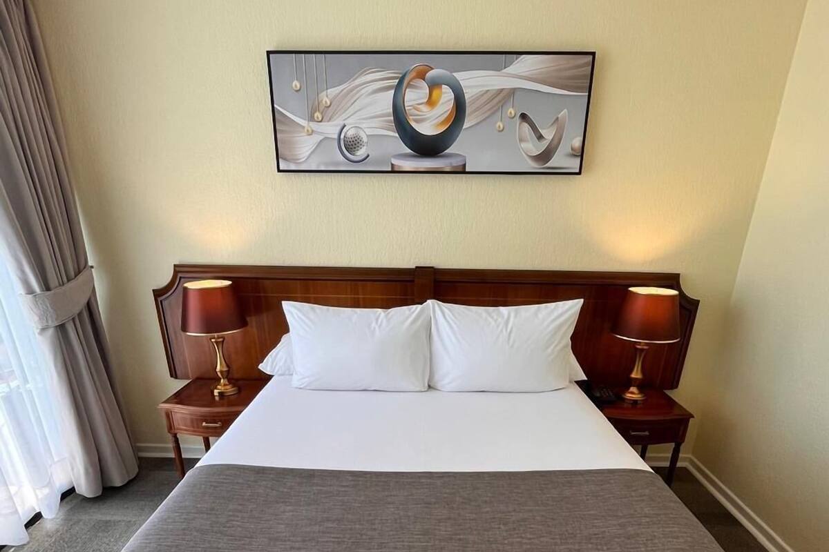 In-room safe, desk, laptop workspace, blackout curtains