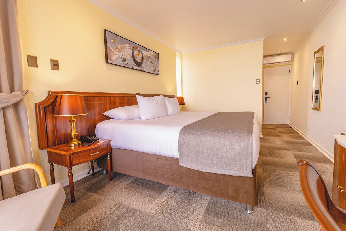 In-room safe, desk, laptop workspace, blackout curtains
