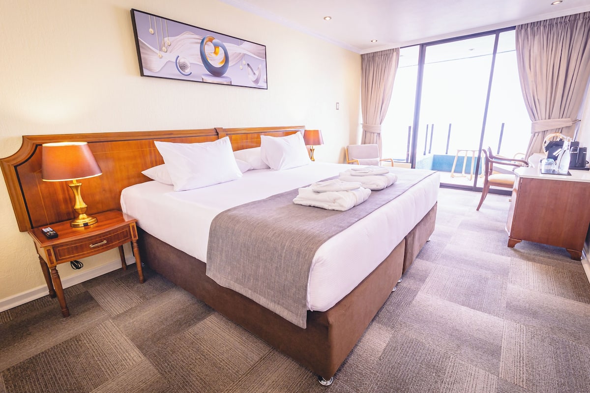 In-room safe, desk, laptop workspace, blackout curtains