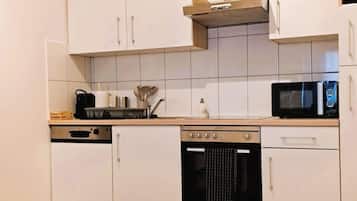 Deluxe Apartment, 2 Bedrooms, Kitchen, City View | Private kitchen | Full-sized fridge, microwave, stovetop, electric kettle