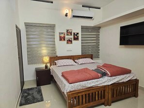 3 habitaciones, tabla de planchar con plancha, wifi y ropa de cama