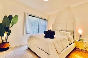 2 bedrooms, desk, iron/ironing board, travel crib