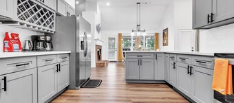 Modern, Freshly Updated 5- Bedroom Brick Home just Minutes from the airport.