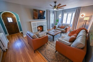 TV, fireplace - Charm on Cherry Street (Denver)