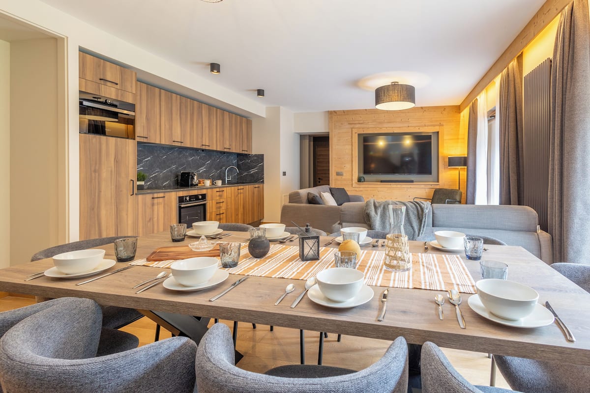 Family Apartment, 4 Bedrooms, Balcony, River View | Living area | 70-cm Smart TV with digital channels, Netflix, MP3 dock