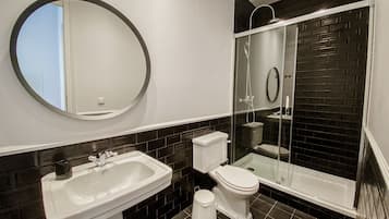 Shower, towels, toilet paper