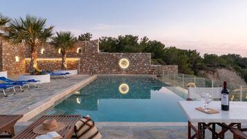 Seasonal outdoor pool, pool umbrellas, pool loungers