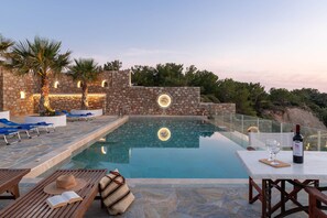Seasonal outdoor pool, pool umbrellas, sun loungers - Arte Pefki Beachfront Suites (Rhodes)
