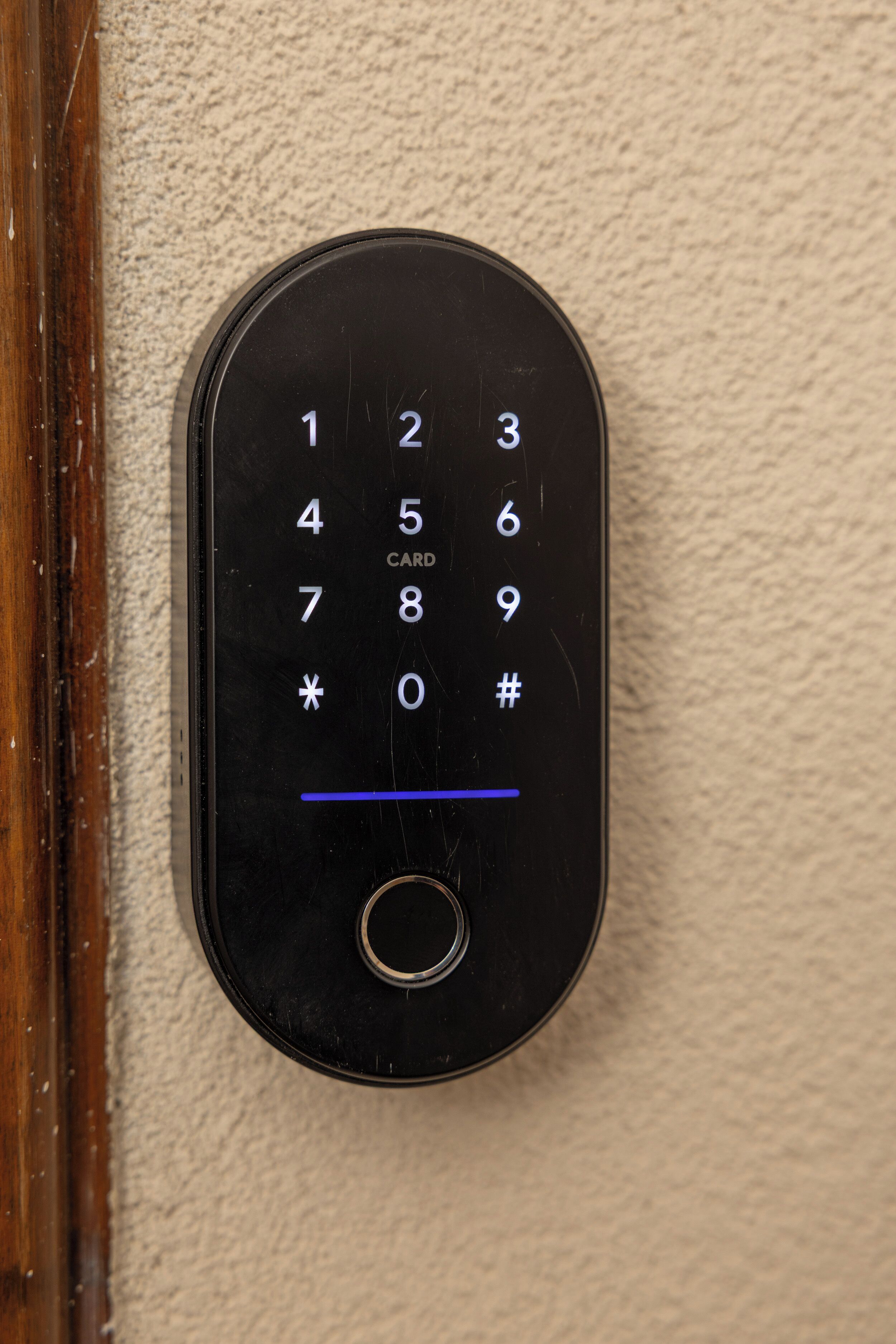 A keypad with numbers and symbols for entering a code.