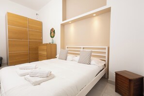 2 habitaciones, tabla de planchar con plancha y wifi gratis 