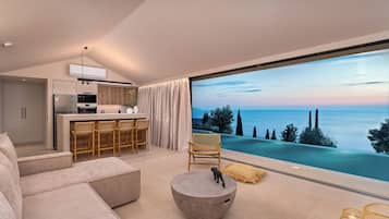Superior Villa, Private Pool & Sea View | Living room | 50-inch Smart TV with satellite channels
