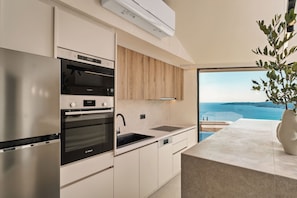 Superior Villa, Private Pool & Sea View | Private kitchen | Full-size fridge, microwave, oven, stovetop - Ino Villas Kefalonia  (Simotata)