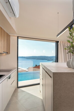 Honeymoon Villa with Private Pool & Sea View | Private kitchen | Full-sized fridge, microwave, oven, stovetop - Ino Villas Kefalonia (Simotata)