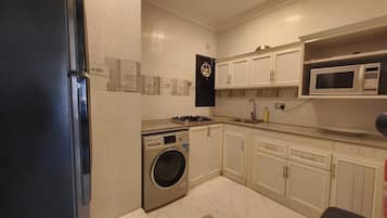 Family Apartment, 2 Bedrooms, Kitchen, Tower | Private kitchen | Full-size fridge, microwave, oven, stovetop