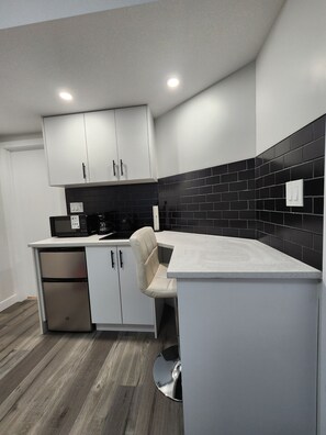 Fridge, microwave, coffee/tea maker, electric kettle