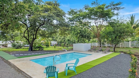 Outdoor pool, open 8:00 AM to 8:00 PM, sun loungers