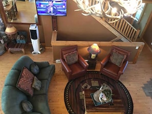 Smart TV, fireplace, books
