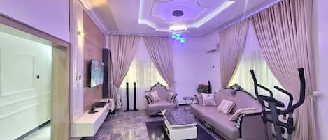 Family Apartment, Balcony, City View | Living area